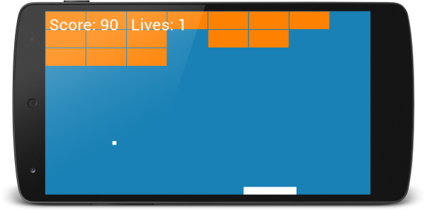 The finished Breakout game running on Android showing the blue background, orange bricks, white paddle, and ball in play.