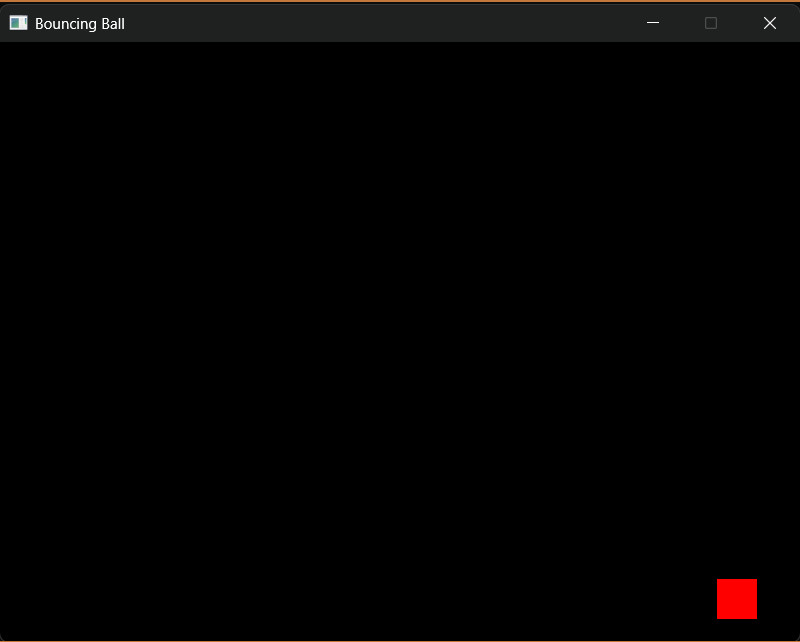 The Bouncing Ball program running, mid-bounce in the lower-right of the window.